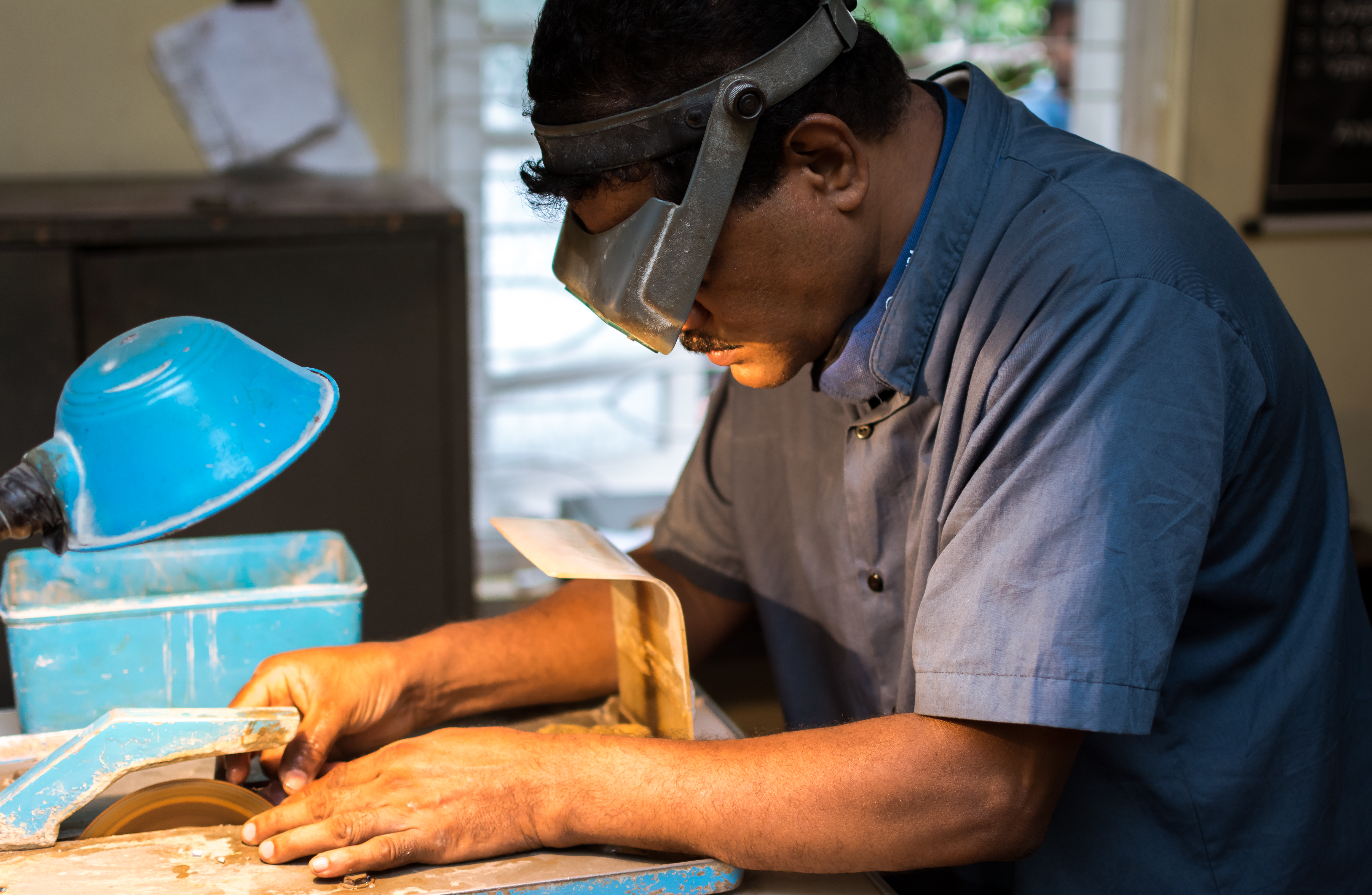 Gem cutter at workbench